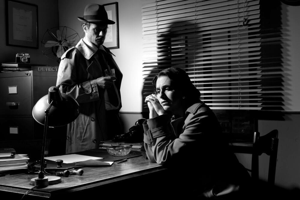 Black and white scene interrogation scene from generic film noir