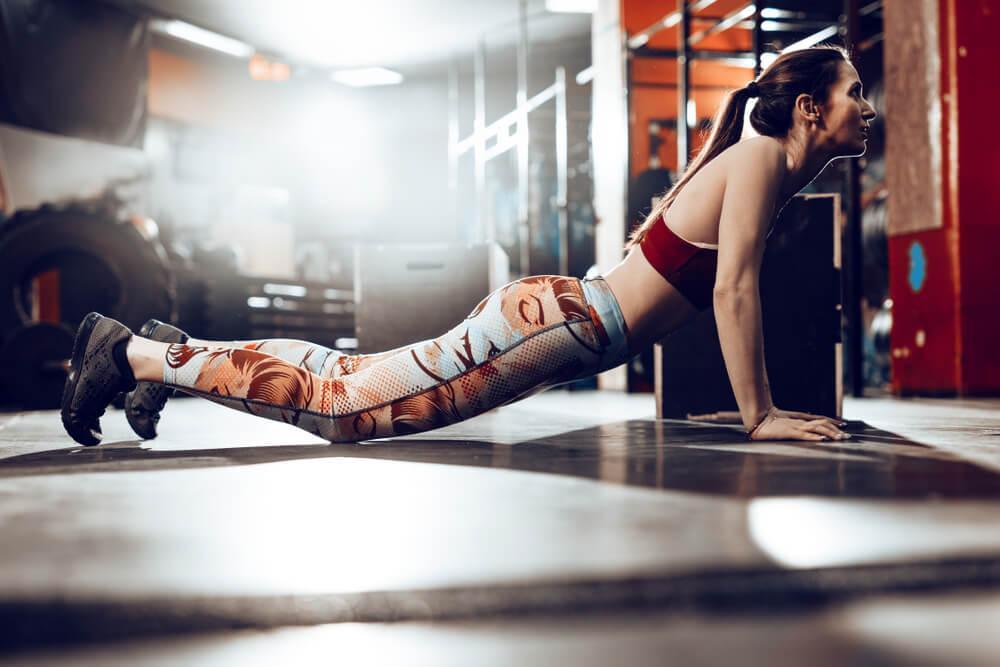 Woman doing burpee workout