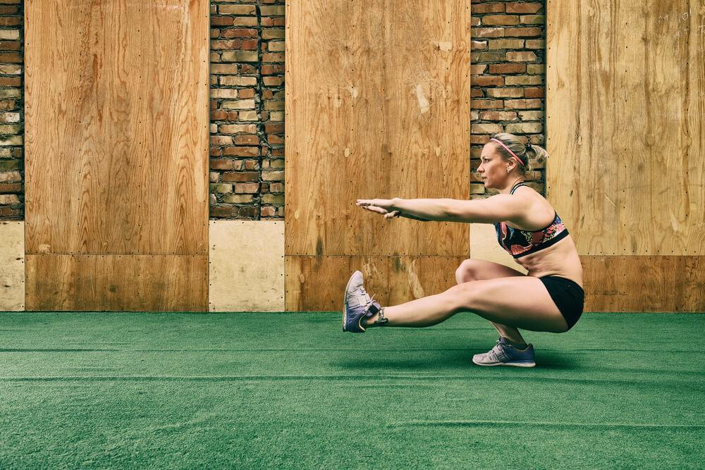 Woman doing the pistol squat exercise