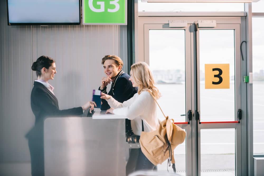 Couple at boarding gate at airport