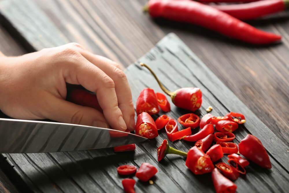 Hand cutting chili