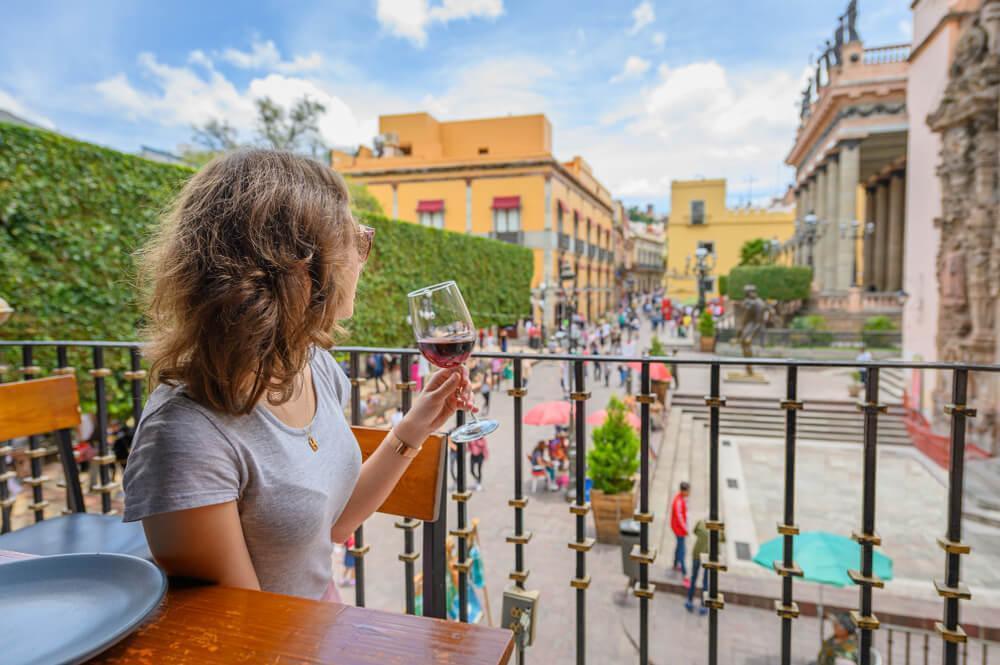 Woman drinking wine in Mexico