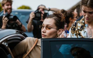 Bella Hadid getting into car