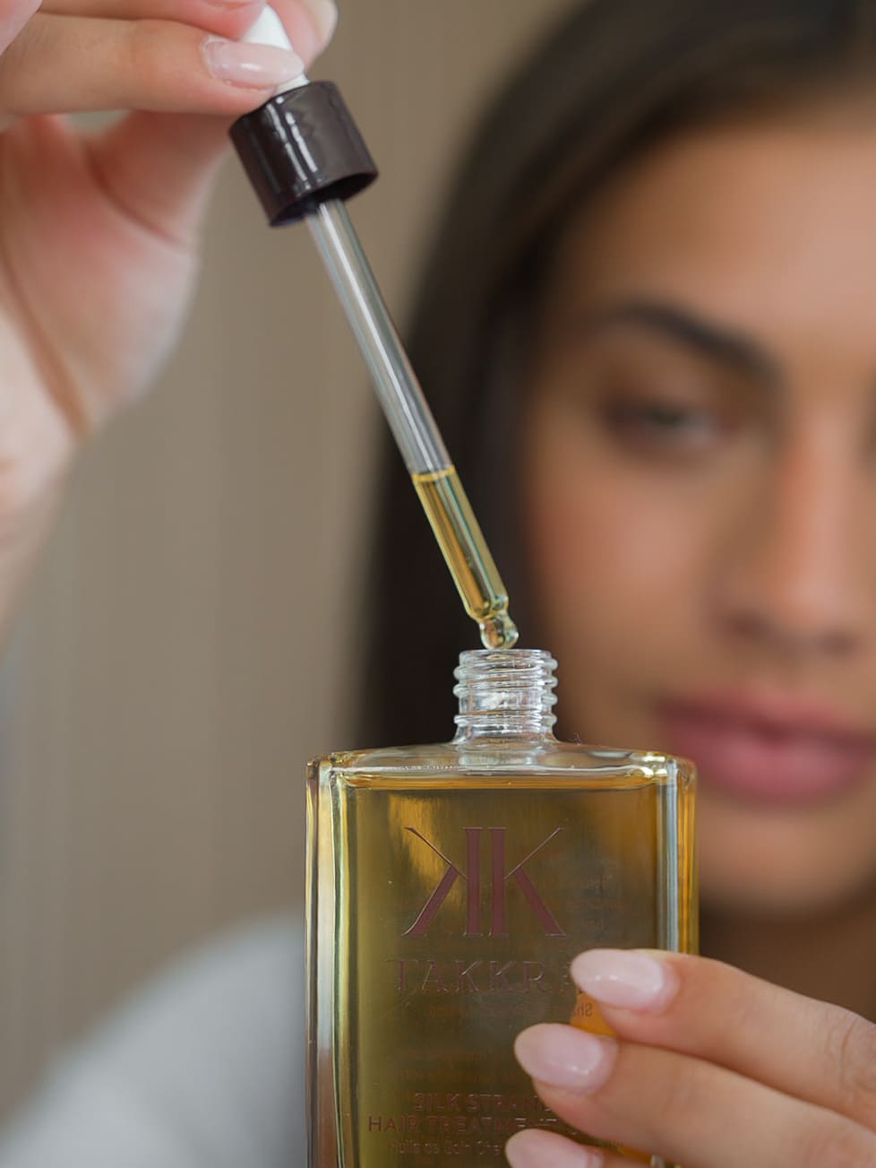 Using the Silk Strand Treatment Hair Oil